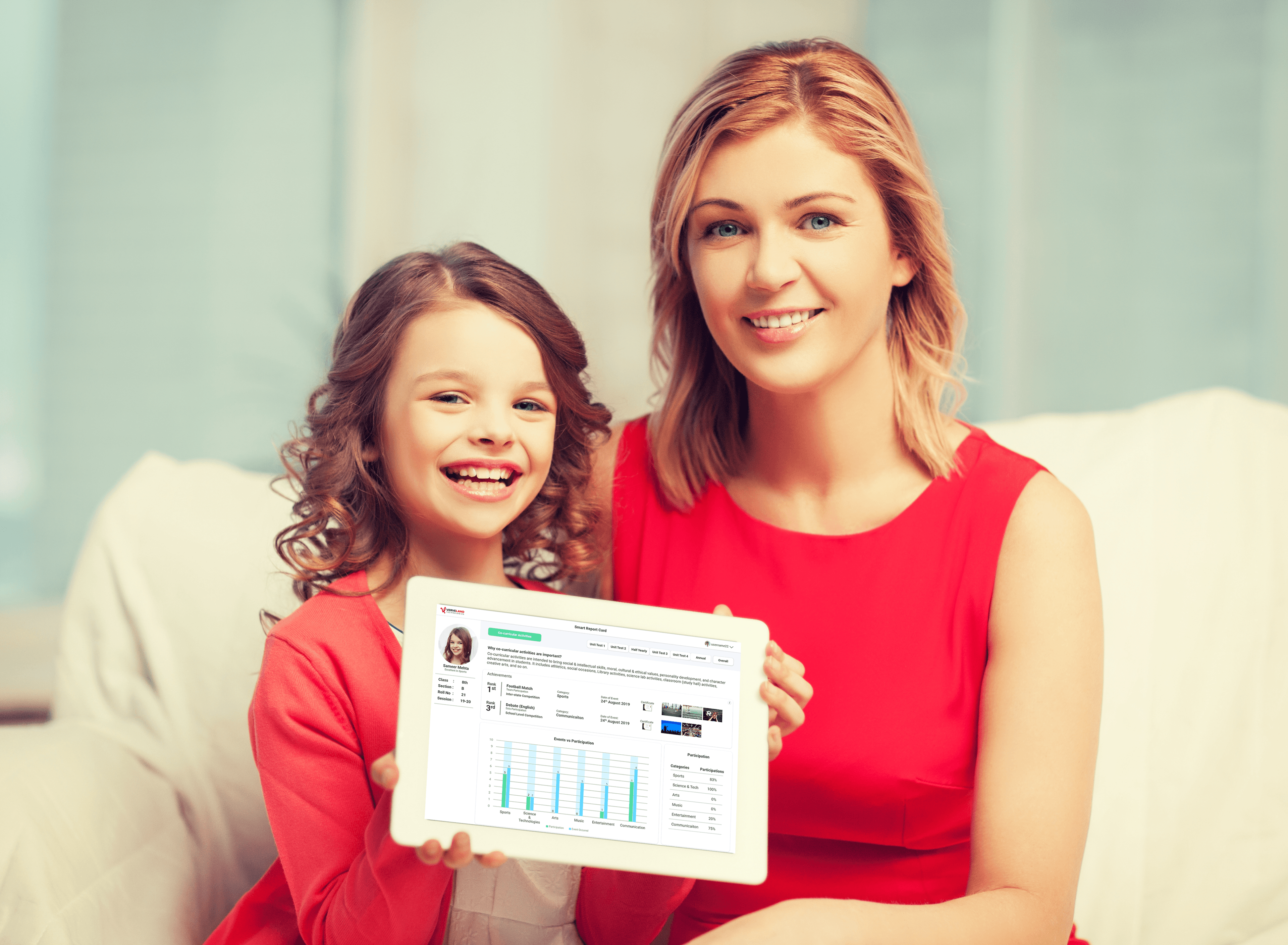 Mother and daughter smiling while reviewing school insights on a tablet